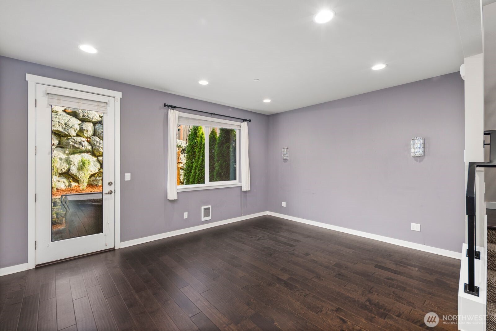 1325 Seattle Hill Road, Unit A2 Bothell, WA 98012 - Photo 16 of 35 an empty room with wooden floor and windows