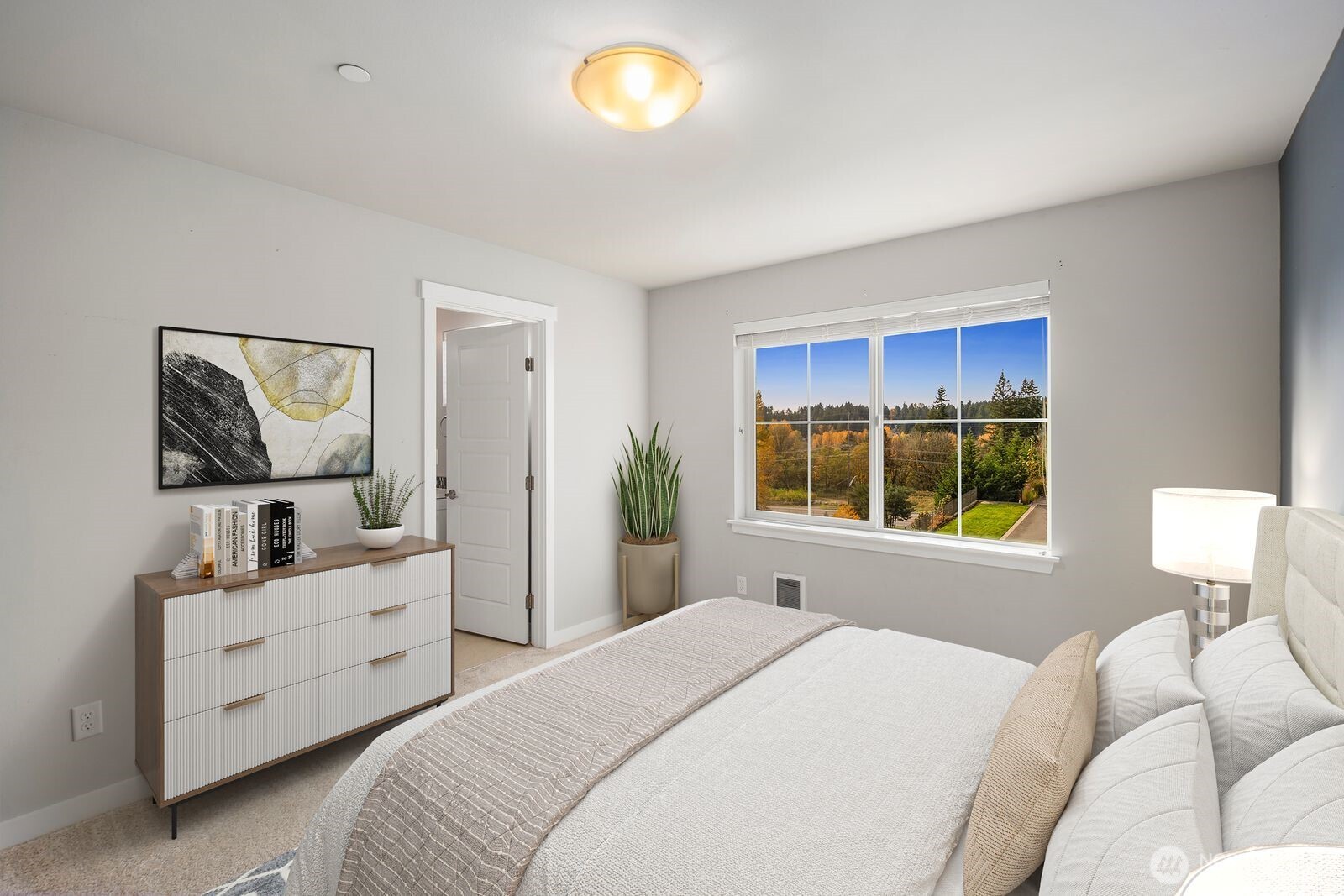 1325 Seattle Hill Road, Unit A2 Bothell, WA 98012 - Photo 22 of 34 a bedroom with a bed and a window