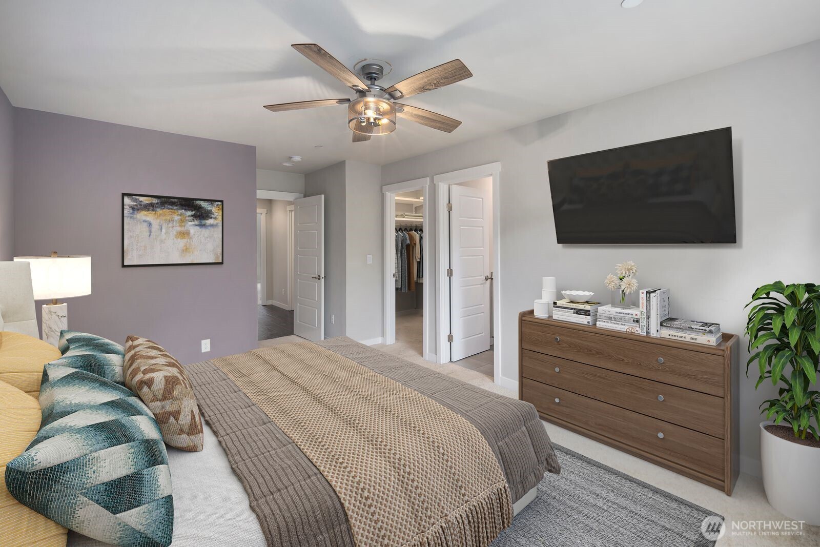 1325 Seattle Hill Road, Unit A2 Bothell, WA 98012 - Photo 28 of 34 a bedroom with a bed and a flat screen tv