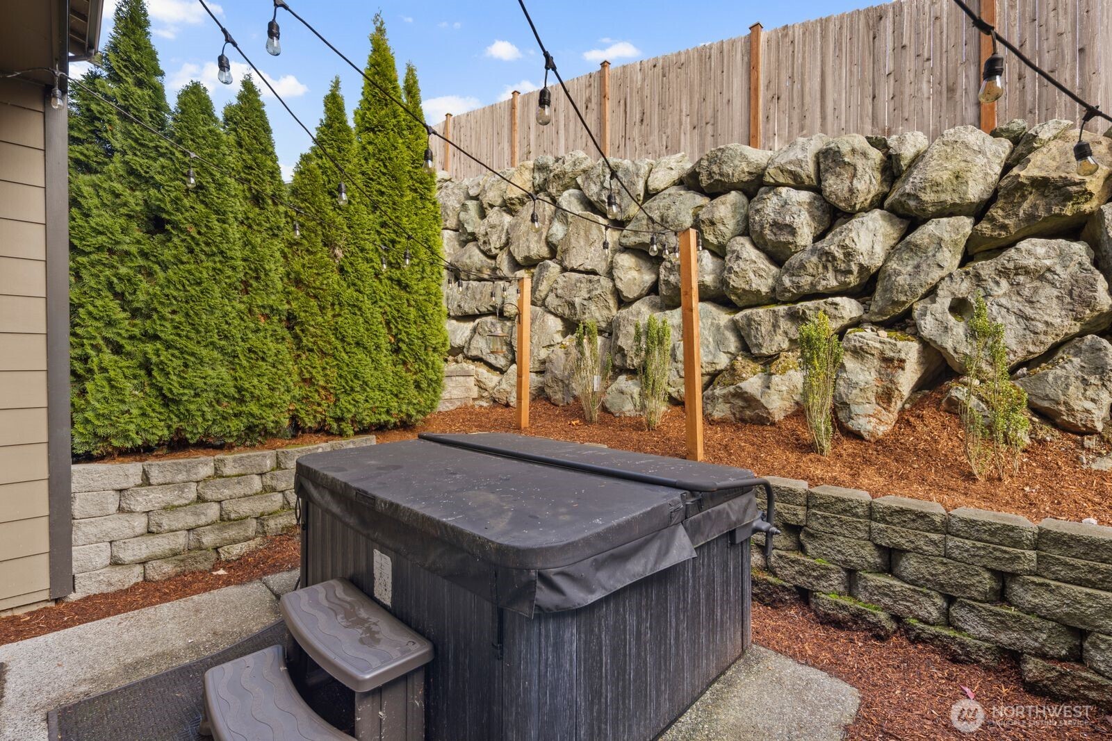 1325 Seattle Hill Road, Unit A2 Bothell, WA 98012 - Photo 34 of 35 a view of a wooden table and chairs