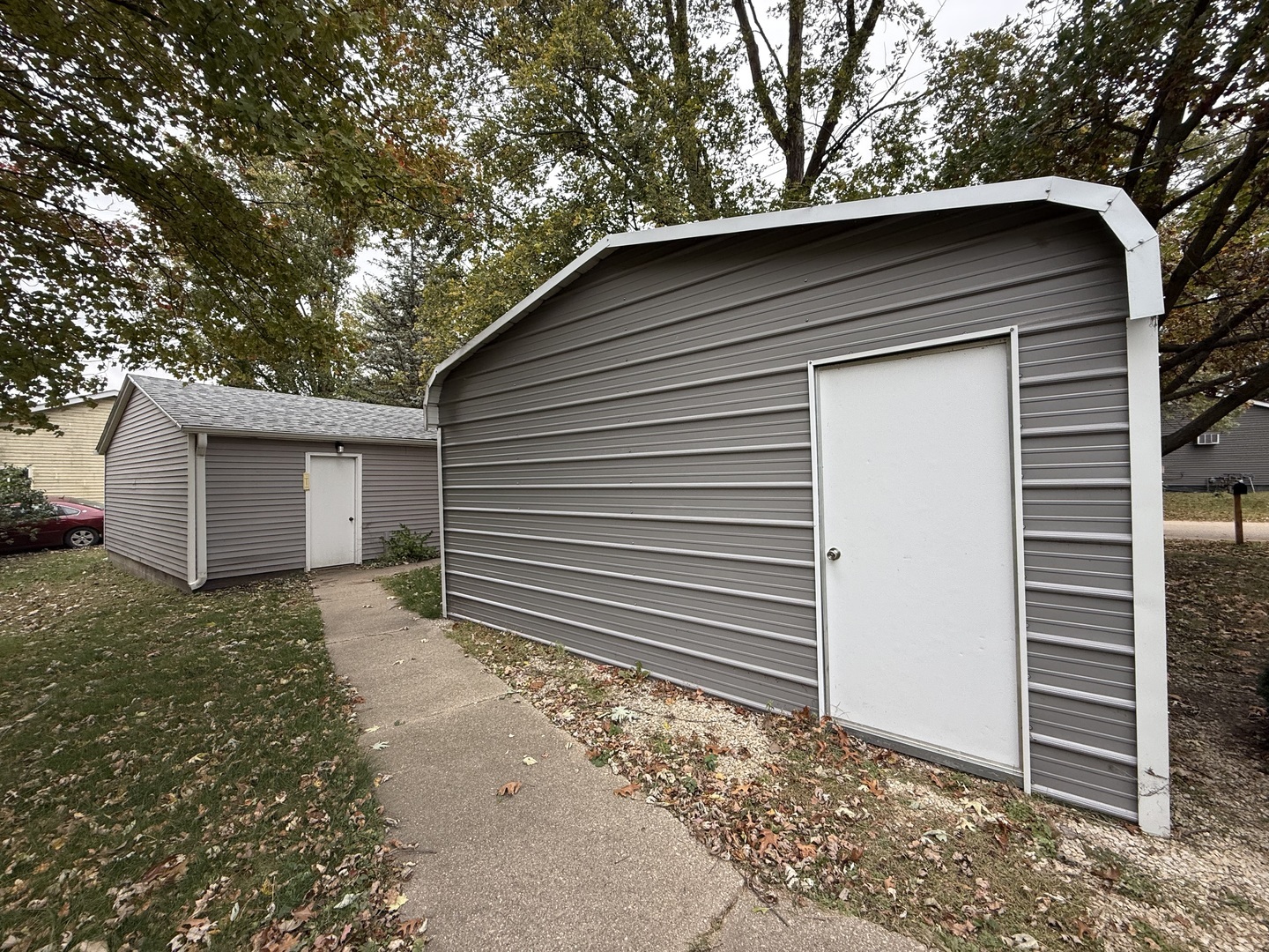1 East Main Street Amboy, IL 61310 - Photo 10 of 32 a house with a yard
