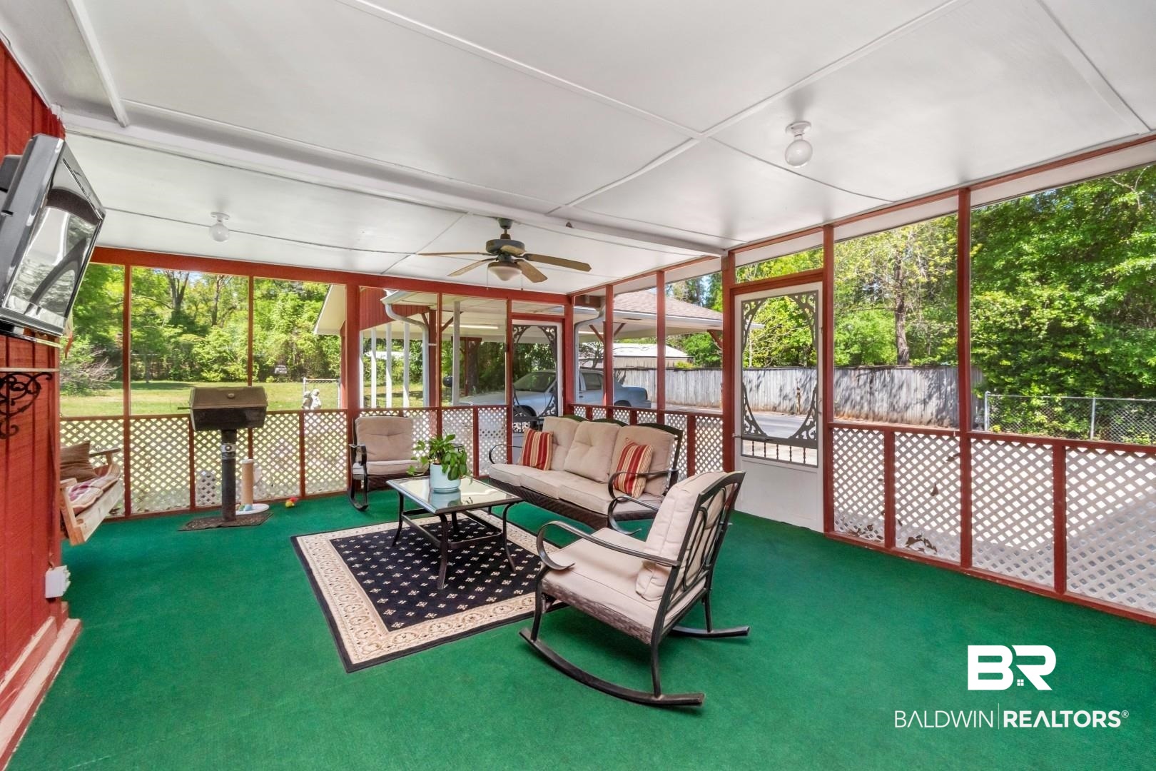6300 Woodcrest Drive Mobile, AL 36608 - Photo 22 of 35 Sunroom with an outdoor hangout area and a ceiling fan