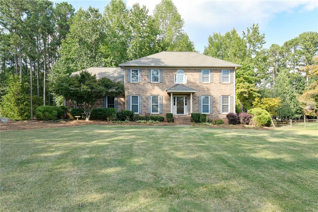 5980 Collins Road Acworth, GA 30101 - Photo 1 of 1 GORGEOUS BRICK HOME WITH BEAUTIFUL ONE ACRE LOT