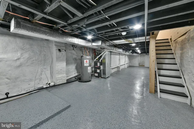 a view of empty room with stairs
