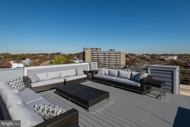a view of a terrace with furniture and outdoor space