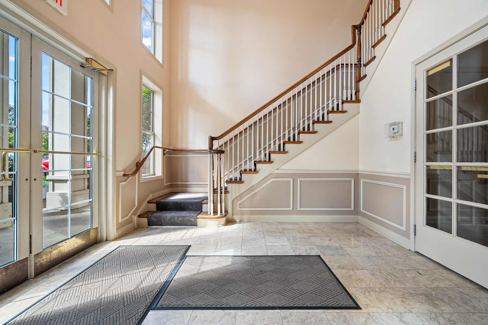 511 Prestwick Lane, Unit 402 Wheeling, IL 60090 - Photo 24 of 27 a view of entryway and hall with wooden floor