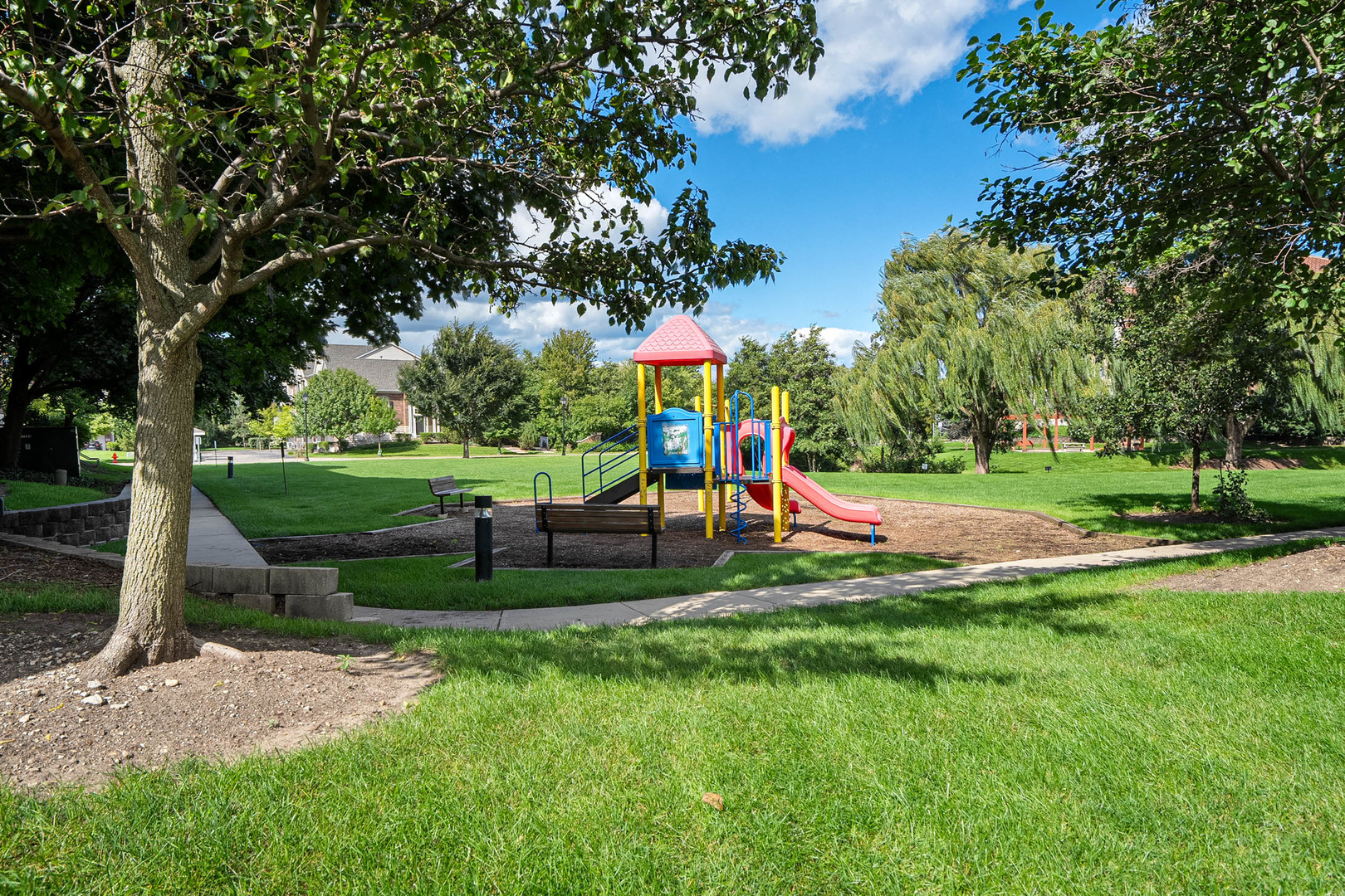 511 Prestwick Lane, Unit 402 Wheeling, IL 60090 - Photo 25 of 27 a view of a park with slide
