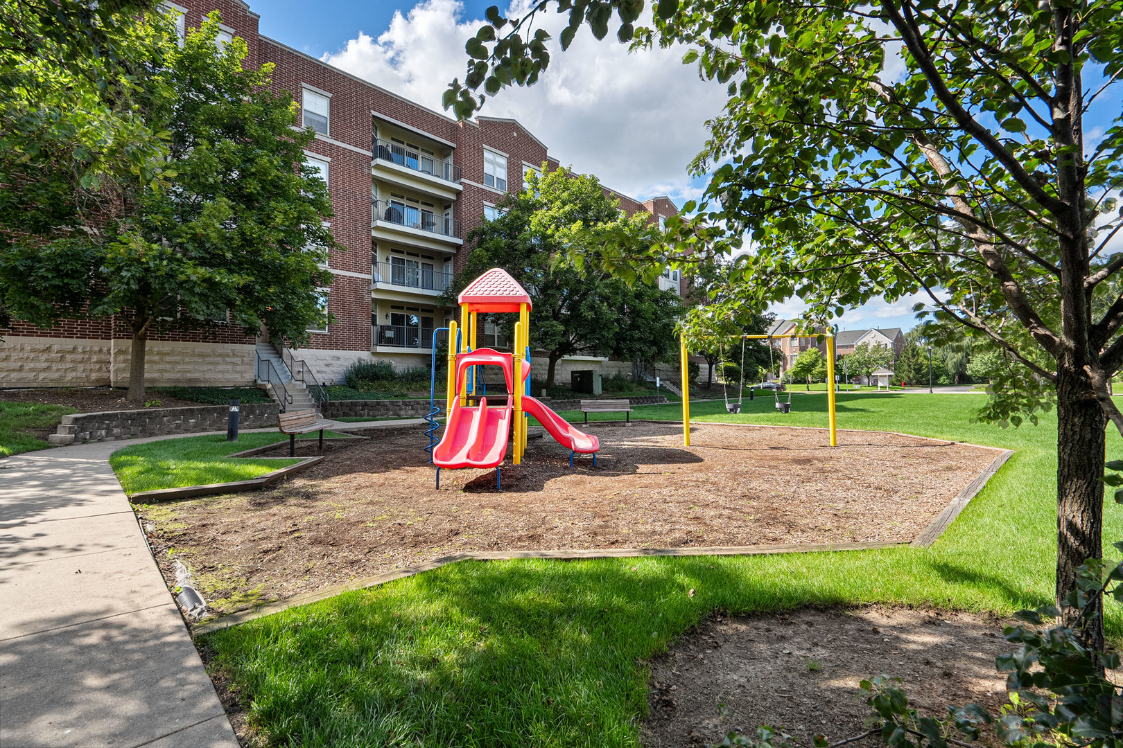 511 Prestwick Lane, Unit 402 Wheeling, IL 60090 - Photo 26 of 27 a view of a park with large trees and plants