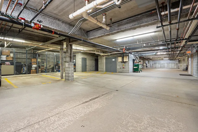 a view of an empty room with storage