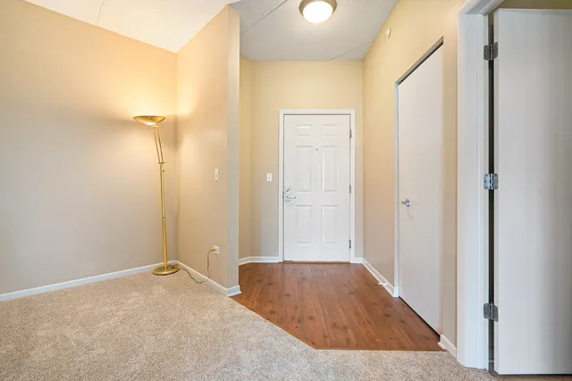 a view of a bathroom with a tub and shower