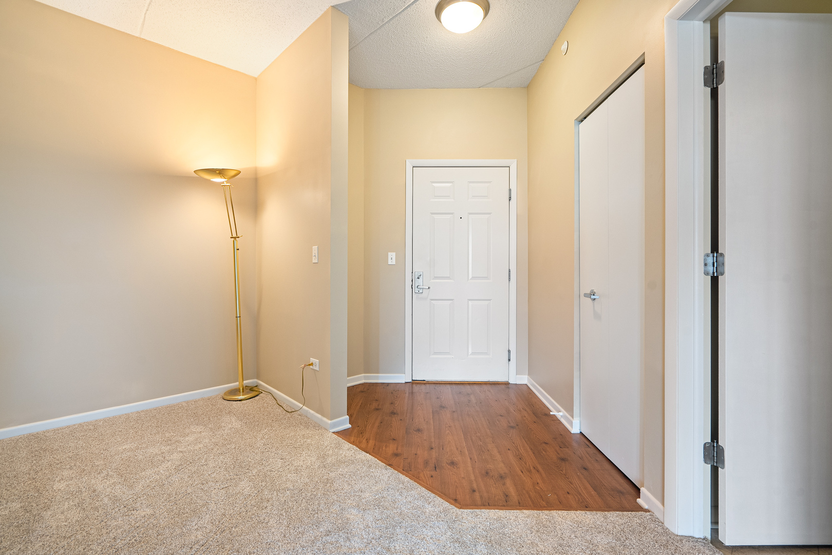511 Prestwick Lane, Unit 402 Wheeling, IL 60090 - Photo 5 of 27 a view of a bathroom with a tub and shower