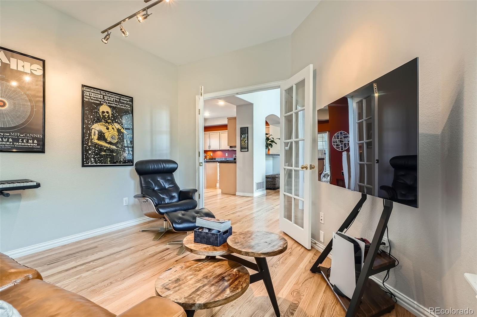 8300 Fairmount Drive, Unit AA102 Denver, CO 80247 - Photo 24 of 27 a view of a workspace with furniture and a window