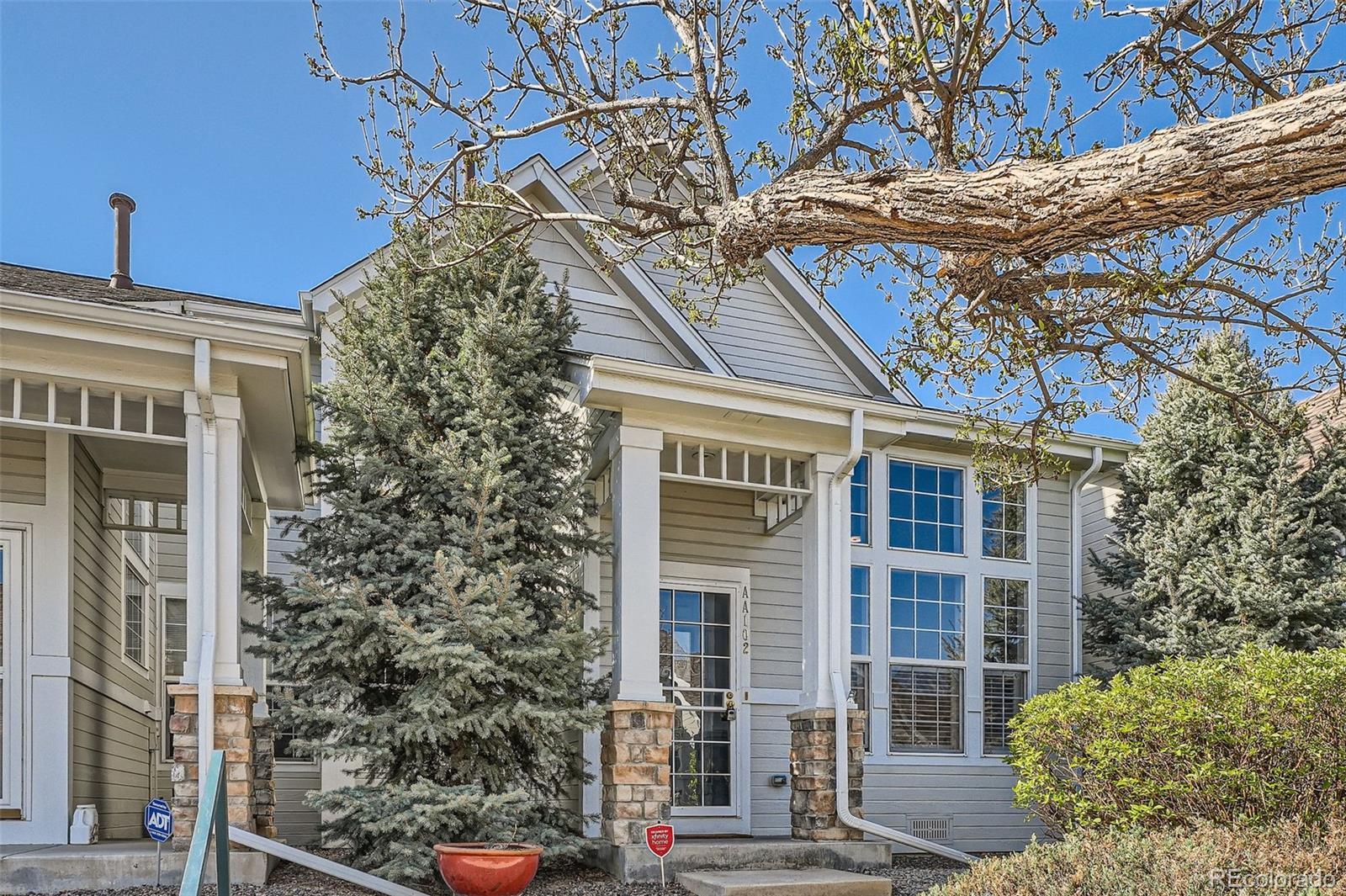 8300 Fairmount Drive, Unit AA102 Denver, CO 80247 - Photo 3 of 27 front view of a building
