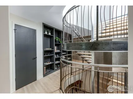 a black and white photo of a living room