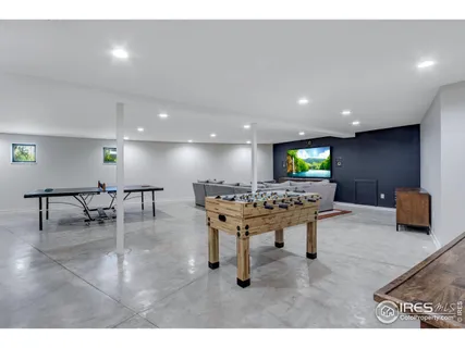 a kitchen with a table and chairs