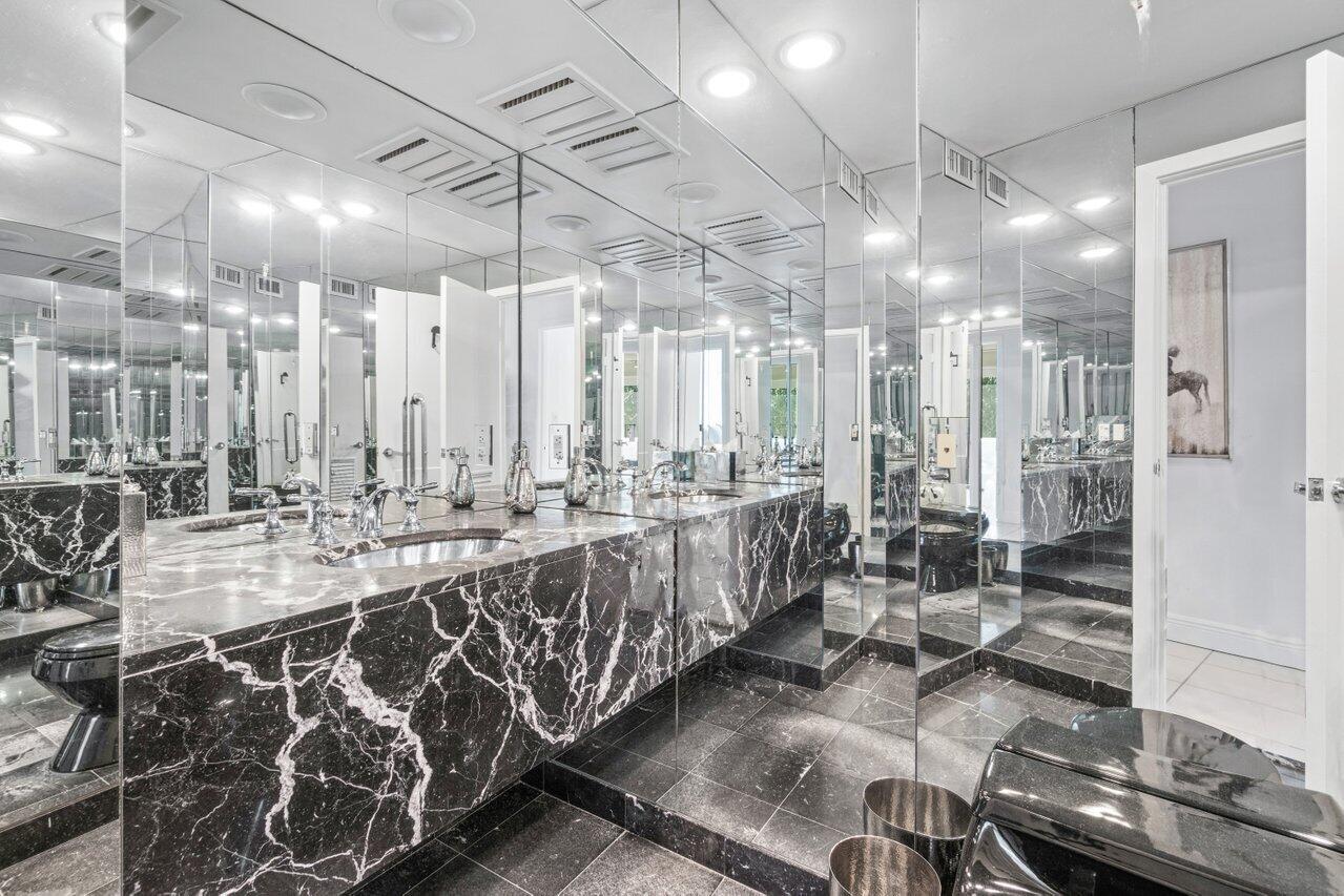 44 Cocoanut Row, Unit 120B Palm Beach, FL 33480 - Photo 14 of 51 a large room with lots of chairs and chandelier