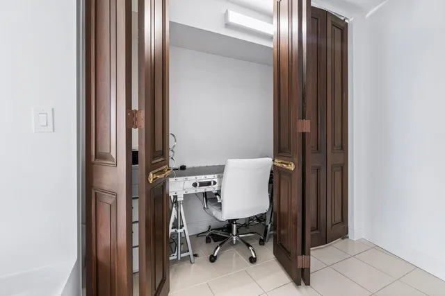 a view of a room that has a door in it