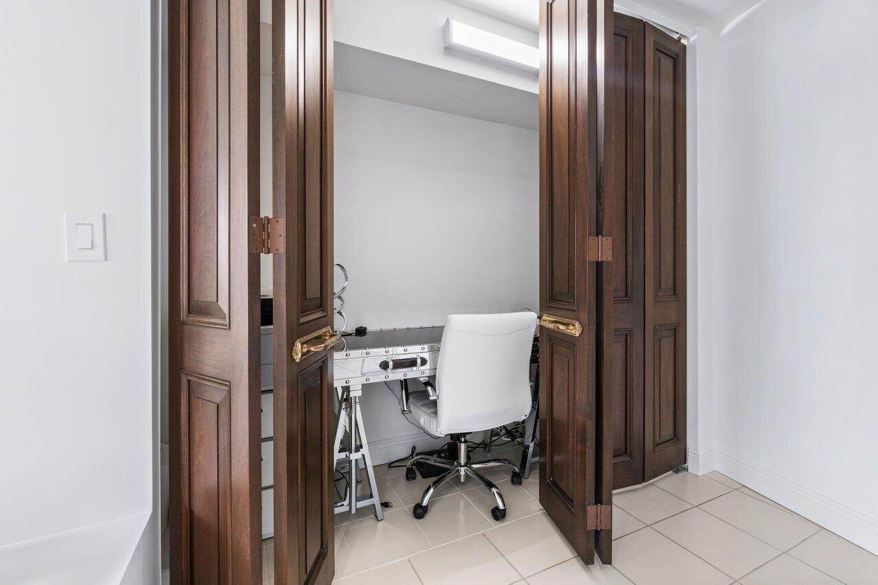 44 Cocoanut Row, Unit 120B Palm Beach, FL 33480 - Photo 21 of 51 a view of a room that has a door in it