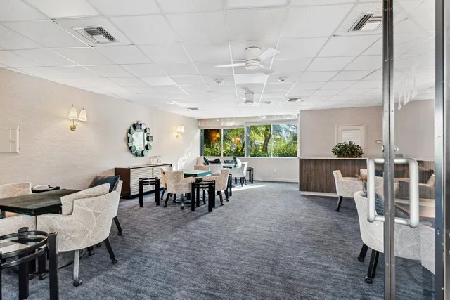 a living room with hard wood flooring and a couch