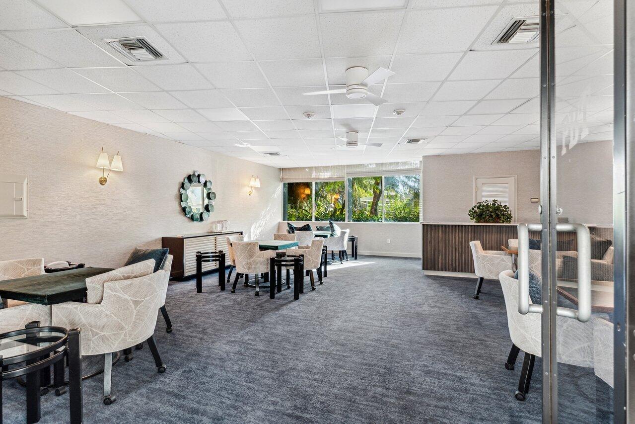44 Cocoanut Row, Unit 120B Palm Beach, FL 33480 - Photo 26 of 51 a view of a dining room with furniture window and outside view