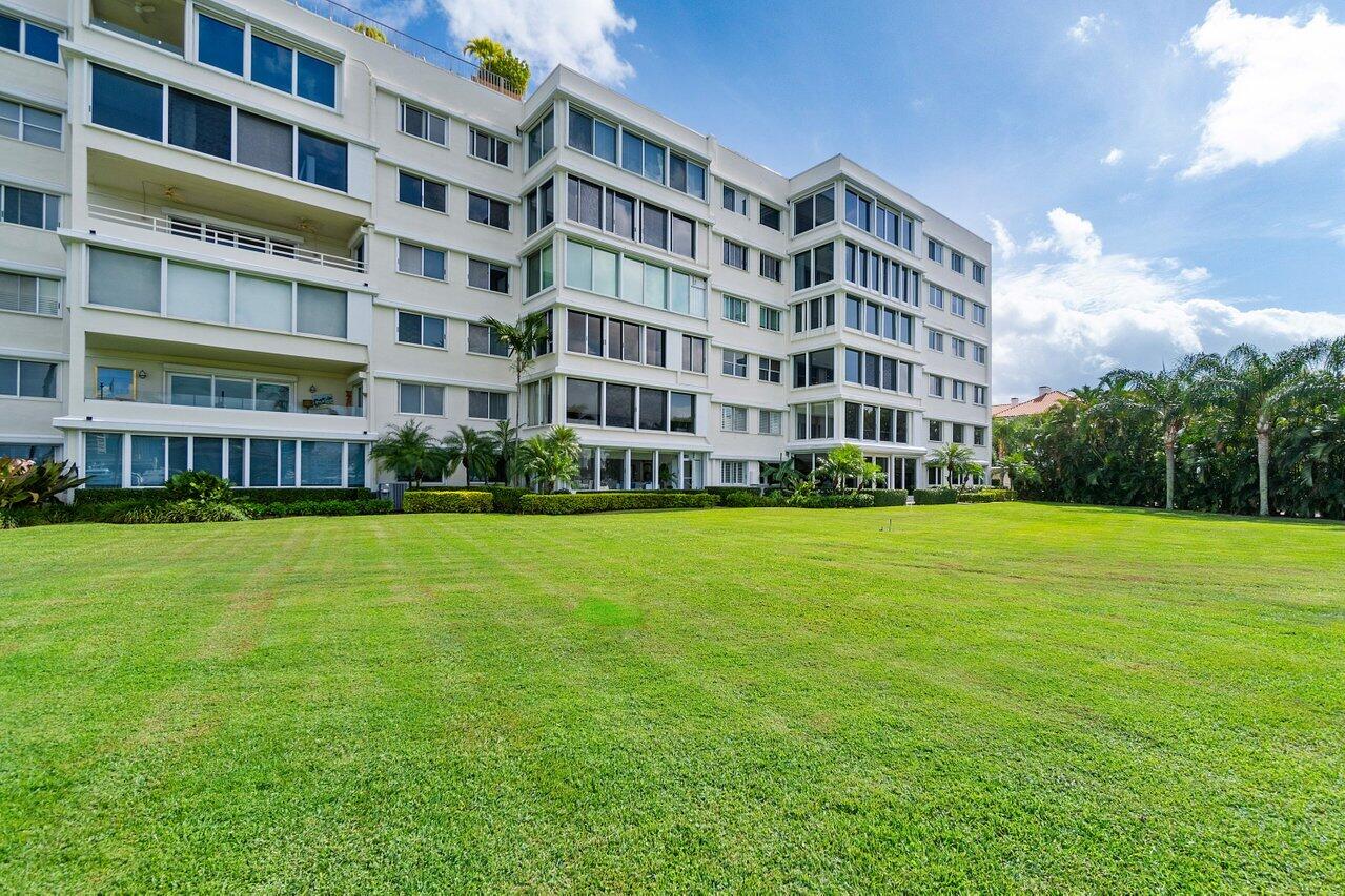 44 Cocoanut Row, Unit 120B Palm Beach, FL 33480 - Photo 33 of 51 a view of building with yard