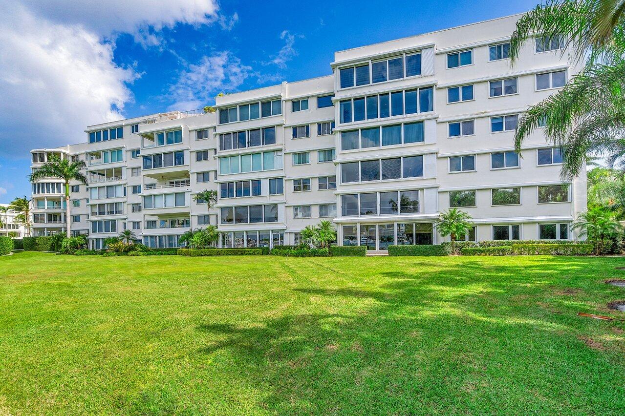 44 Cocoanut Row, Unit 120B Palm Beach, FL 33480 - Photo 34 of 51 a view of a building with a yard