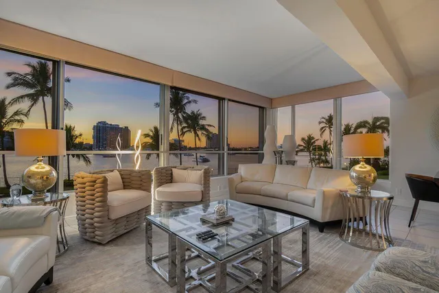 a view of ocean and building in background