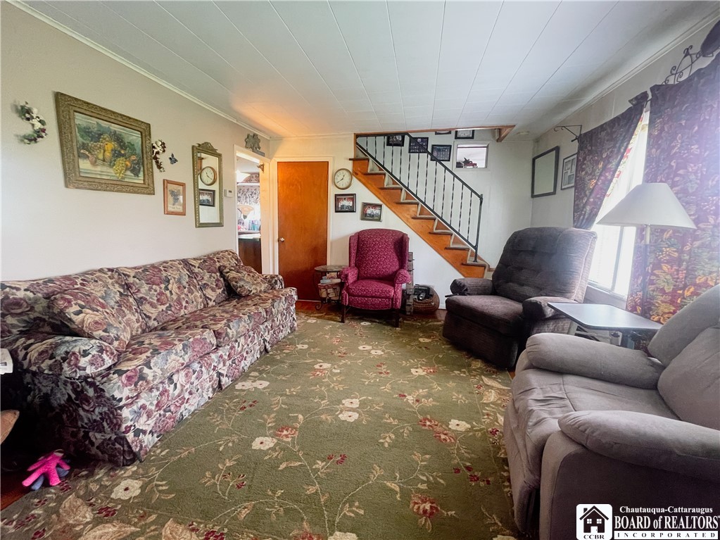 5200 Thornton Road Ellington, NY 14740 - Photo 11 of 20 LIVING ROOM WITH OPEN STAIR CASE