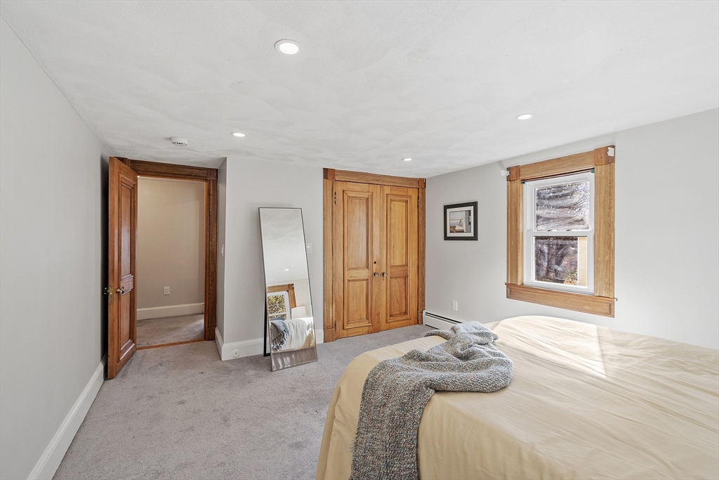 42 Stevens Street, Unit 42 Andover, MA 01810 - Photo 16 of 19 a bedroom with a bed and a window
