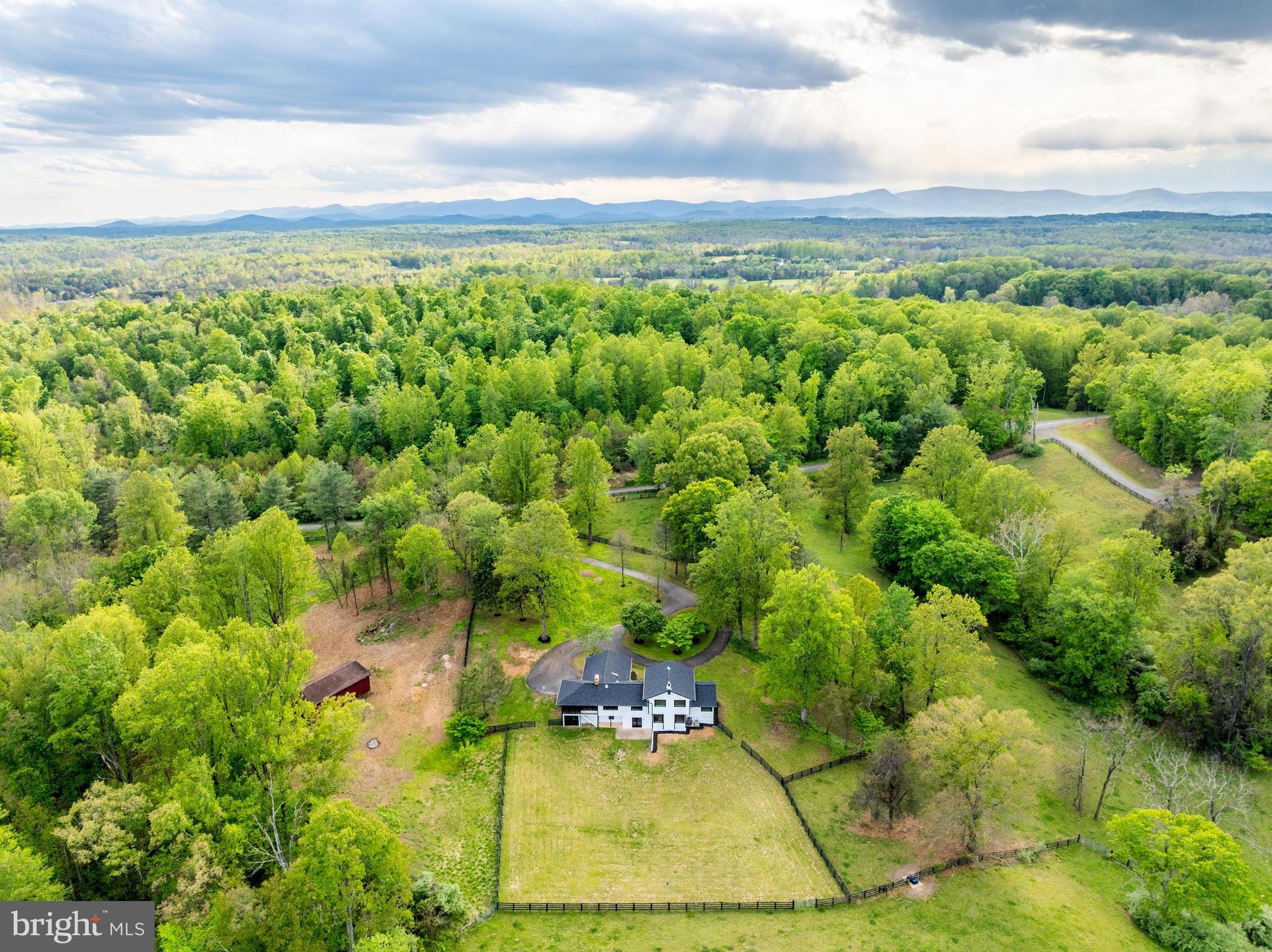 6891 Wilson Road Marshall, VA 20115 - Photo 22 of 118 Serene estate nestled in lush greenery.