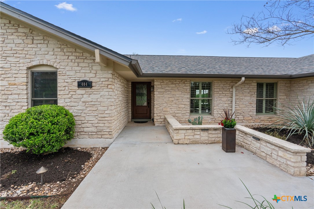 404 Skyline Road Georgetown, TX 78628 - Photo 11 of 40 a front view of a house with entryway