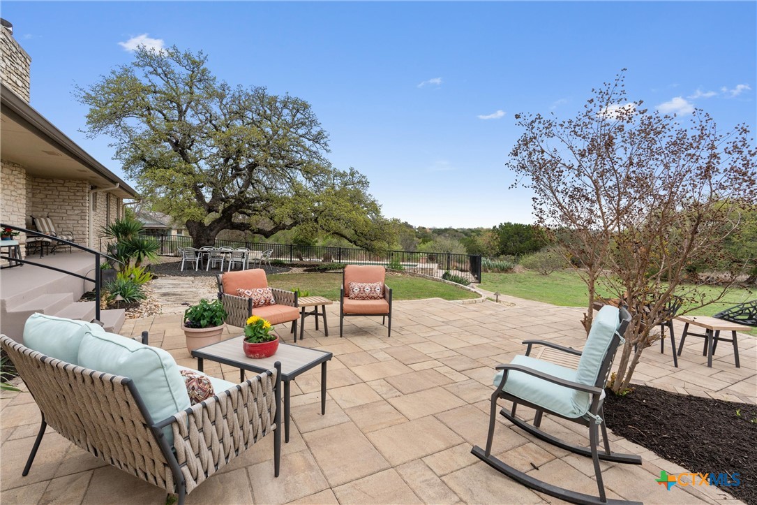 404 Skyline Road Georgetown, TX 78628 - Photo 25 of 40 a view of chair and tables