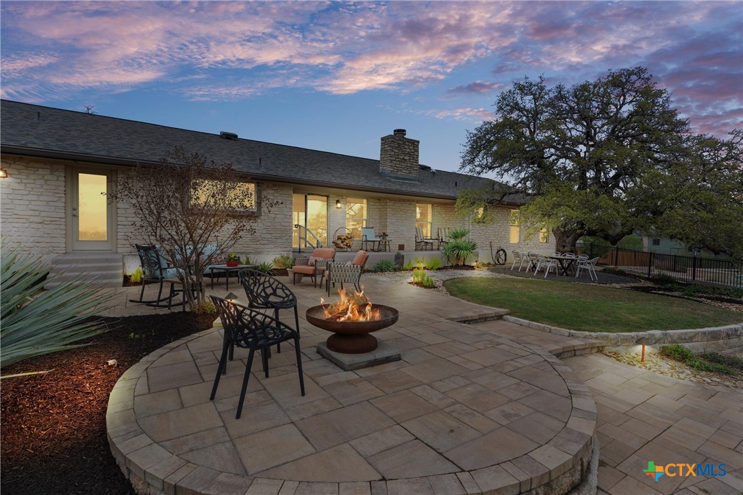 404 Skyline Road Georgetown, TX 78628 - Photo 4 of 40 a view of a house with backyard and sitting area