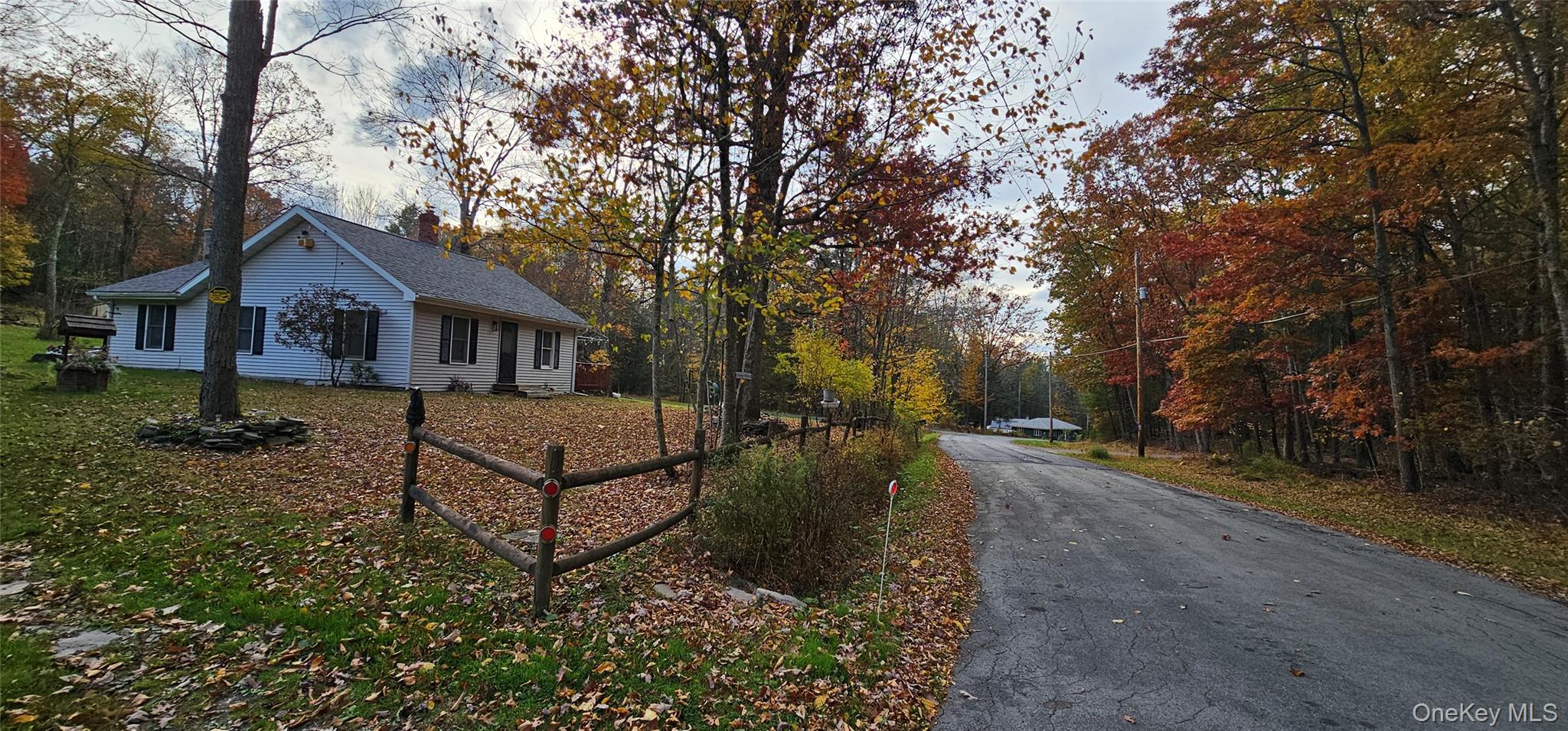87 Parker Road Narrowsburg, NY 12764 - Photo 23 of 23 front view of a house with a yard