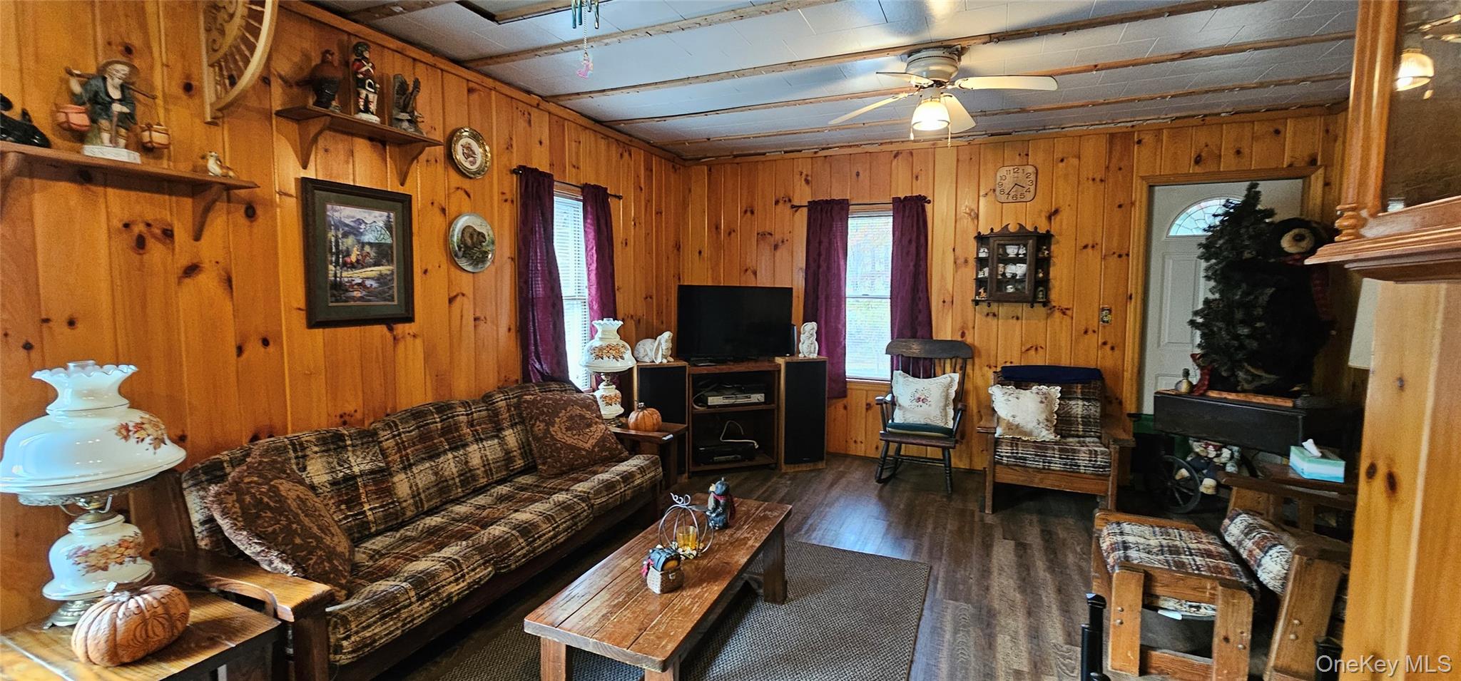87 Parker Road Narrowsburg, NY 12764 - Photo 5 of 23 a living room with furniture and a flat screen tv