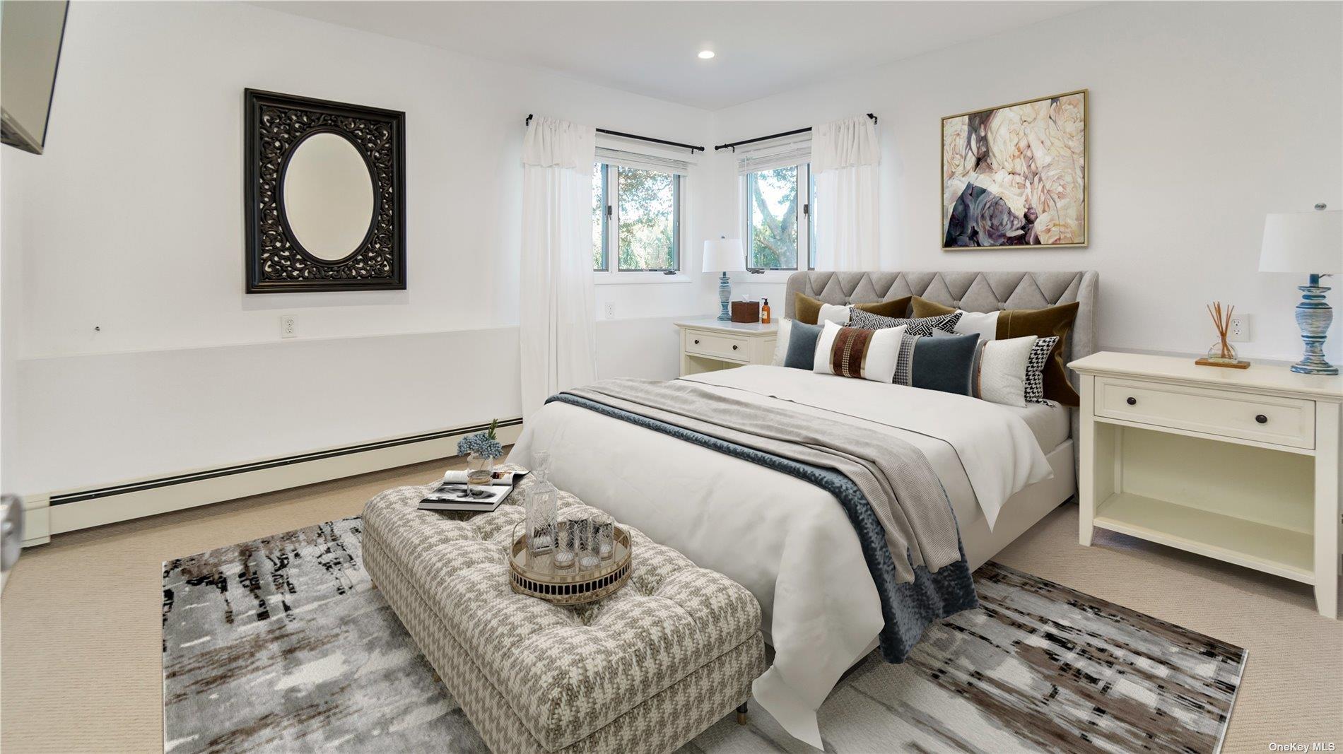 19 Rogers Lane Remsenburg, NY 11960 - Photo 16 of 28 a bedroom with a bed and a painting on the wall