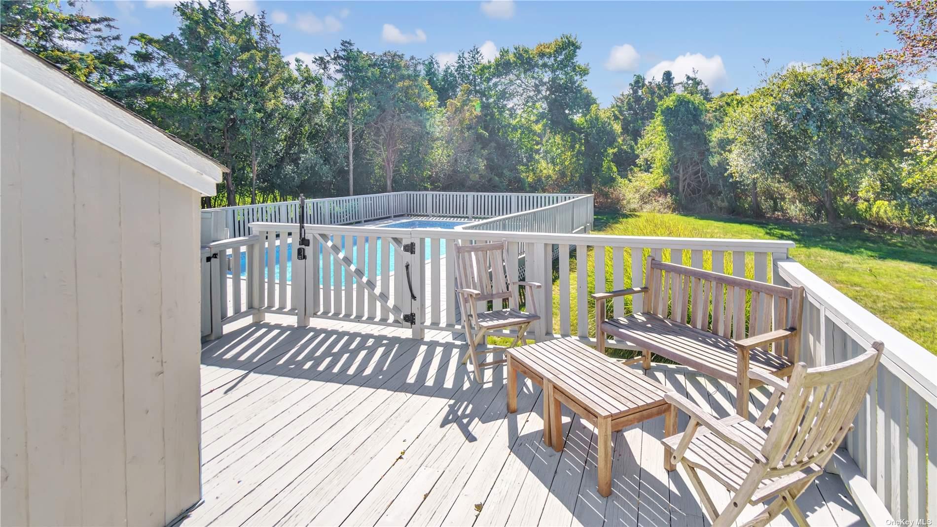 19 Rogers Lane Remsenburg, NY 11960 - Photo 24 of 28 a view of balcony with wooden floor and fence
