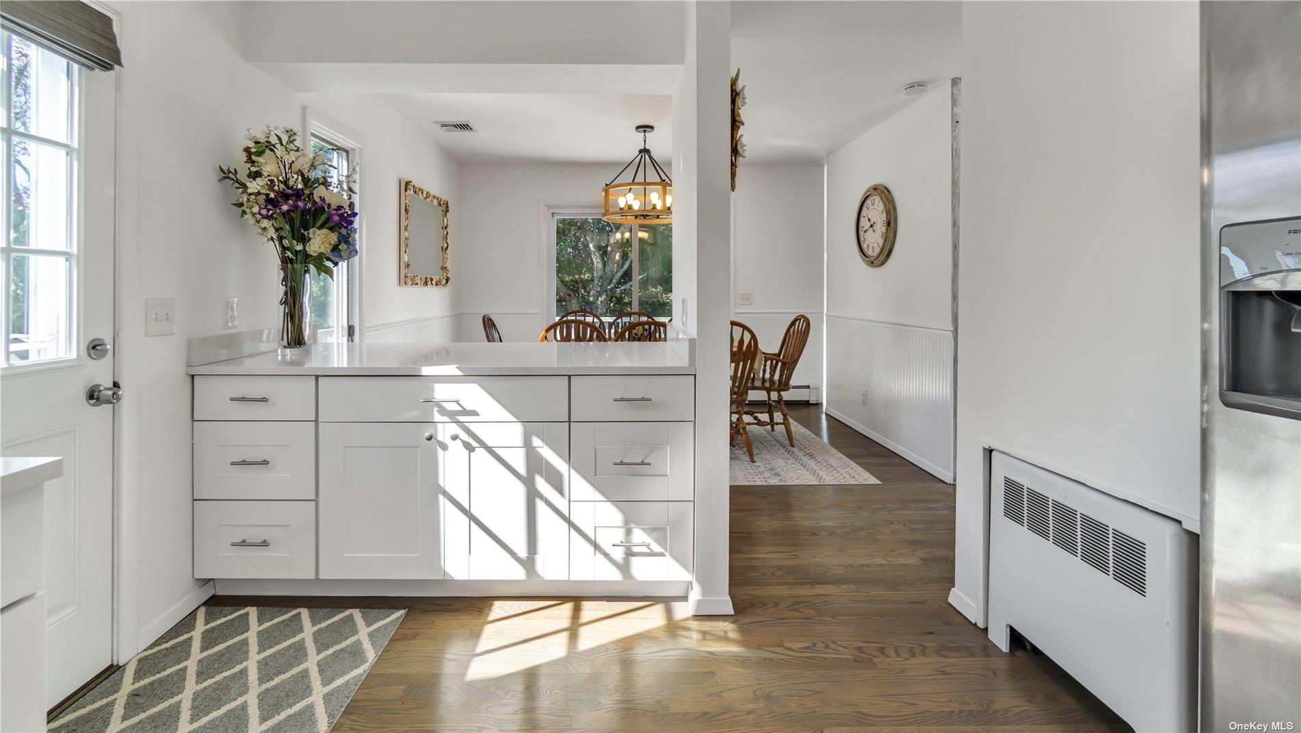 19 Rogers Lane Remsenburg, NY 11960 - Photo 10 of 28 a view of a living room and dining room