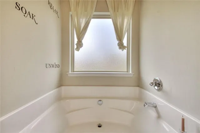 a bathroom with a bathtub