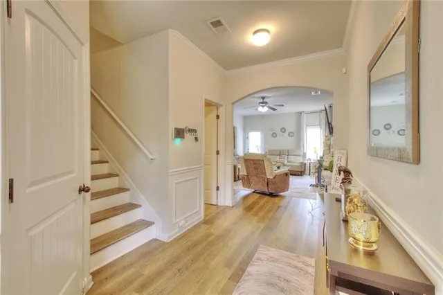 a view of a living room with wooden floor