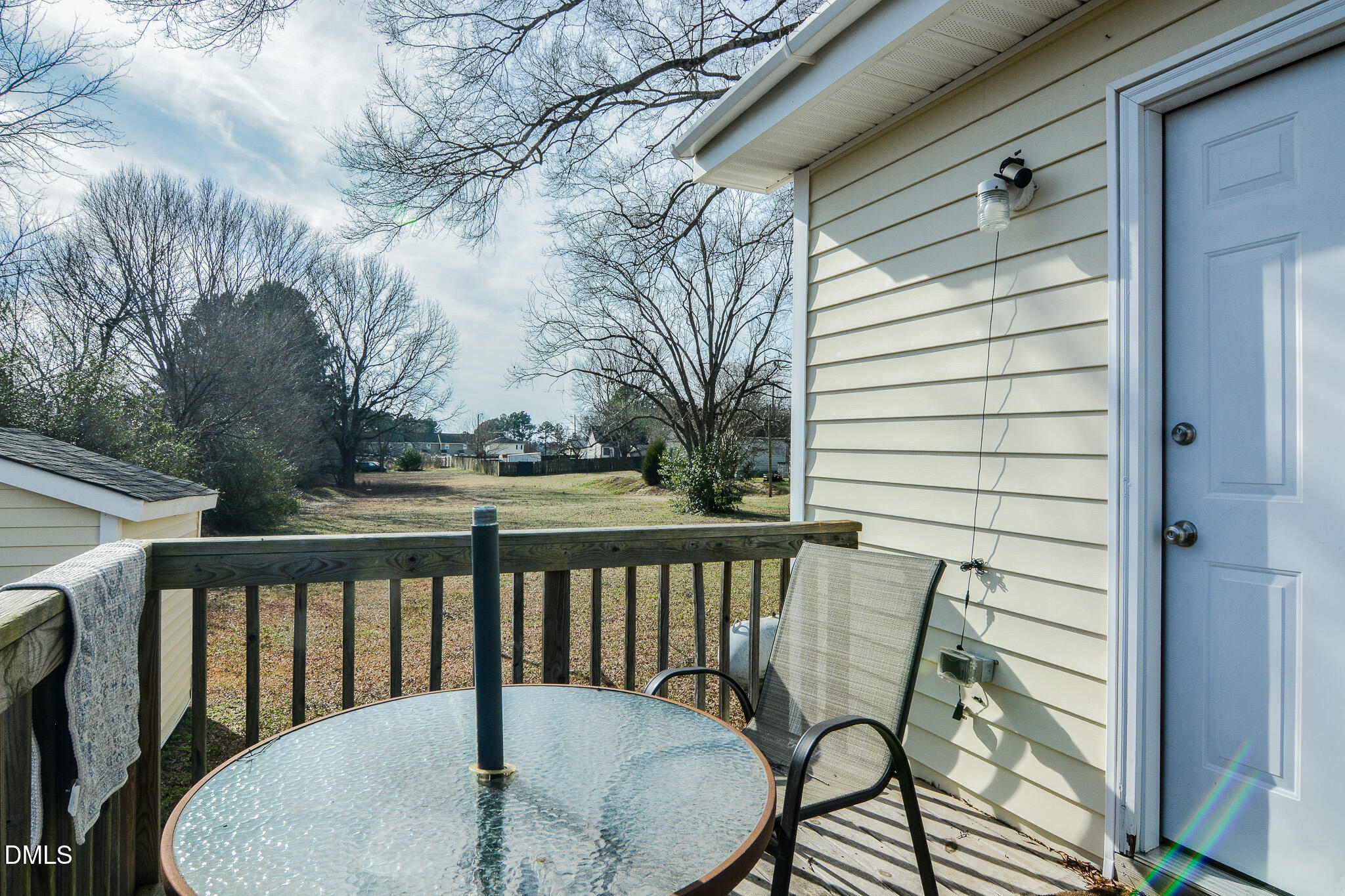 543 West 2nd Street Clayton, NC 27520 - Photo 11 of 13 a view of a balcony with furniture