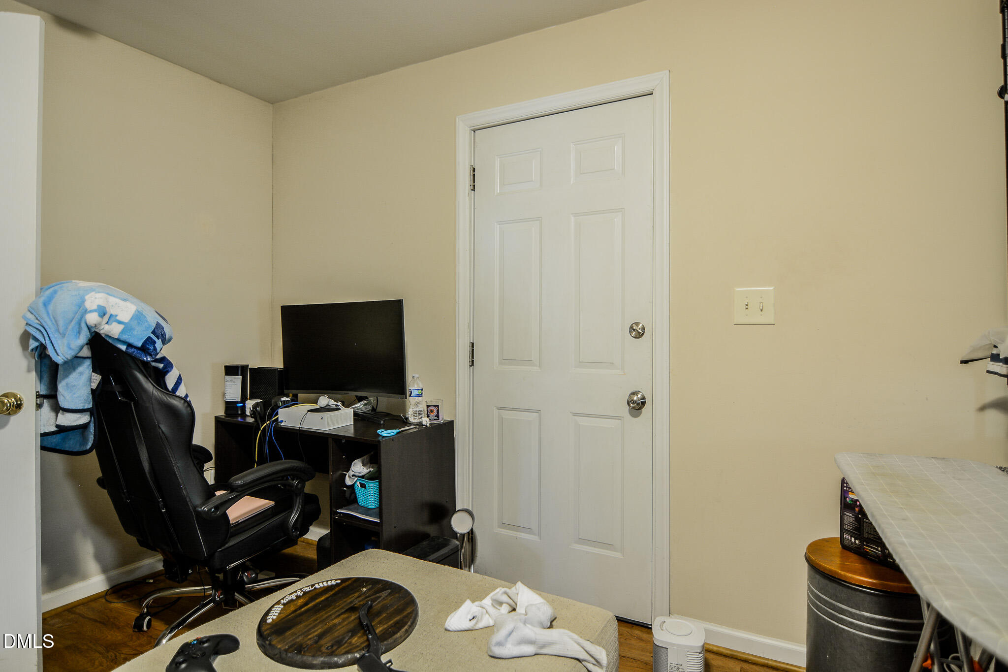 543 West 2nd Street Clayton, NC 27520 - Photo 6 of 13 a view of a workspace with furniture and a window
