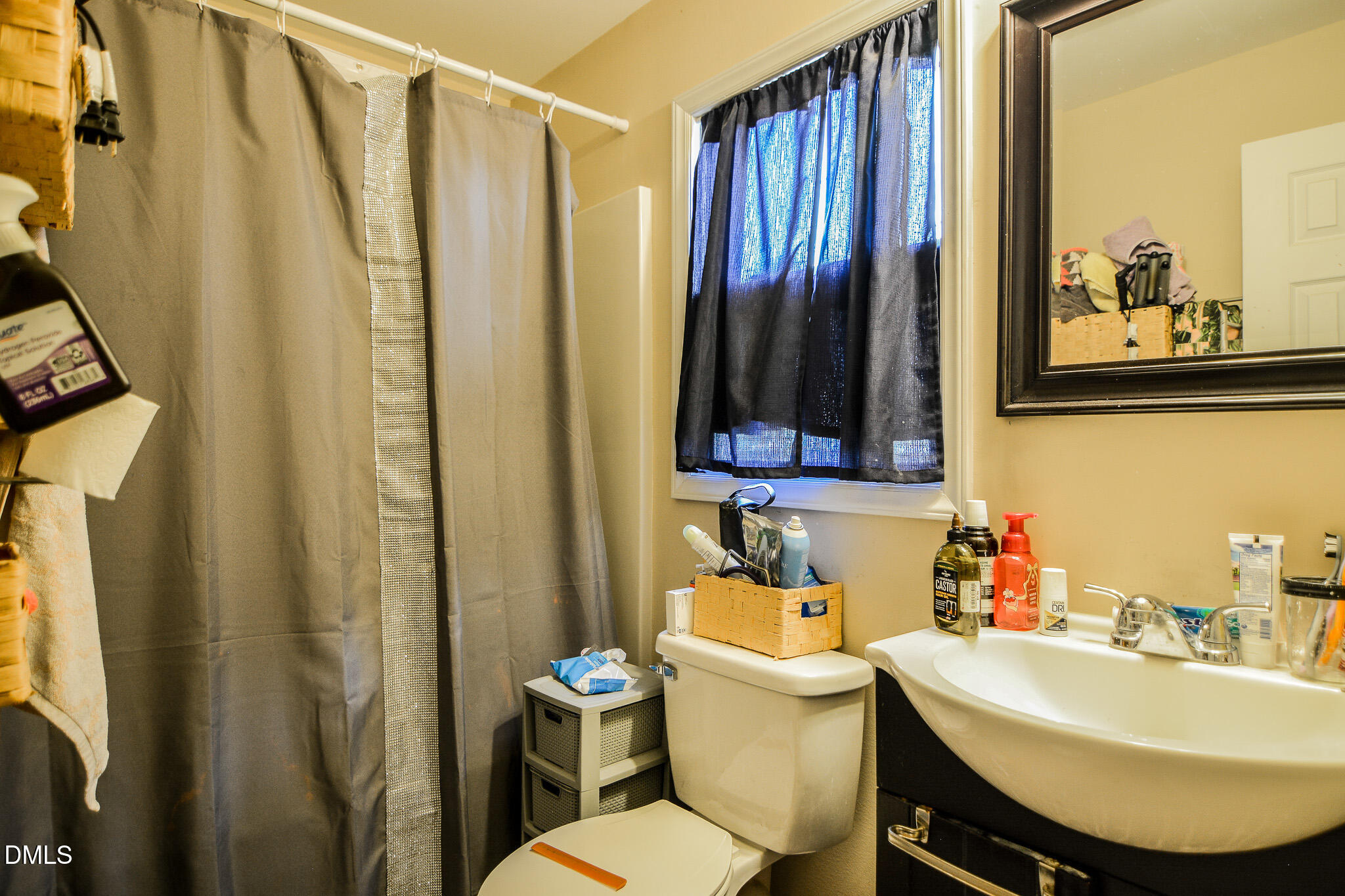 543 West 2nd Street Clayton, NC 27520 - Photo 9 of 13 a bathroom with a sink toilet and shower