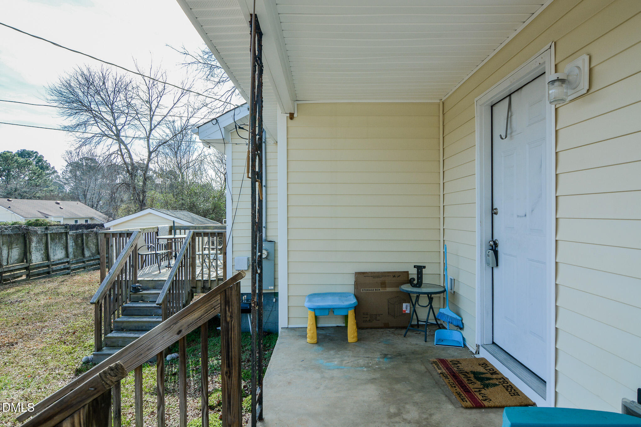 543 West 2nd Street Clayton, NC 27520 - Photo 10 of 13 a balcony view with a seating space