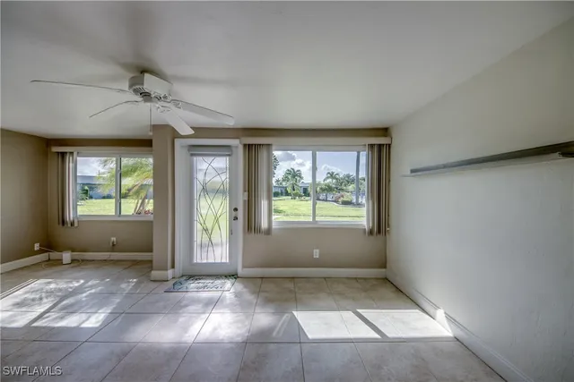 an empty room with windows