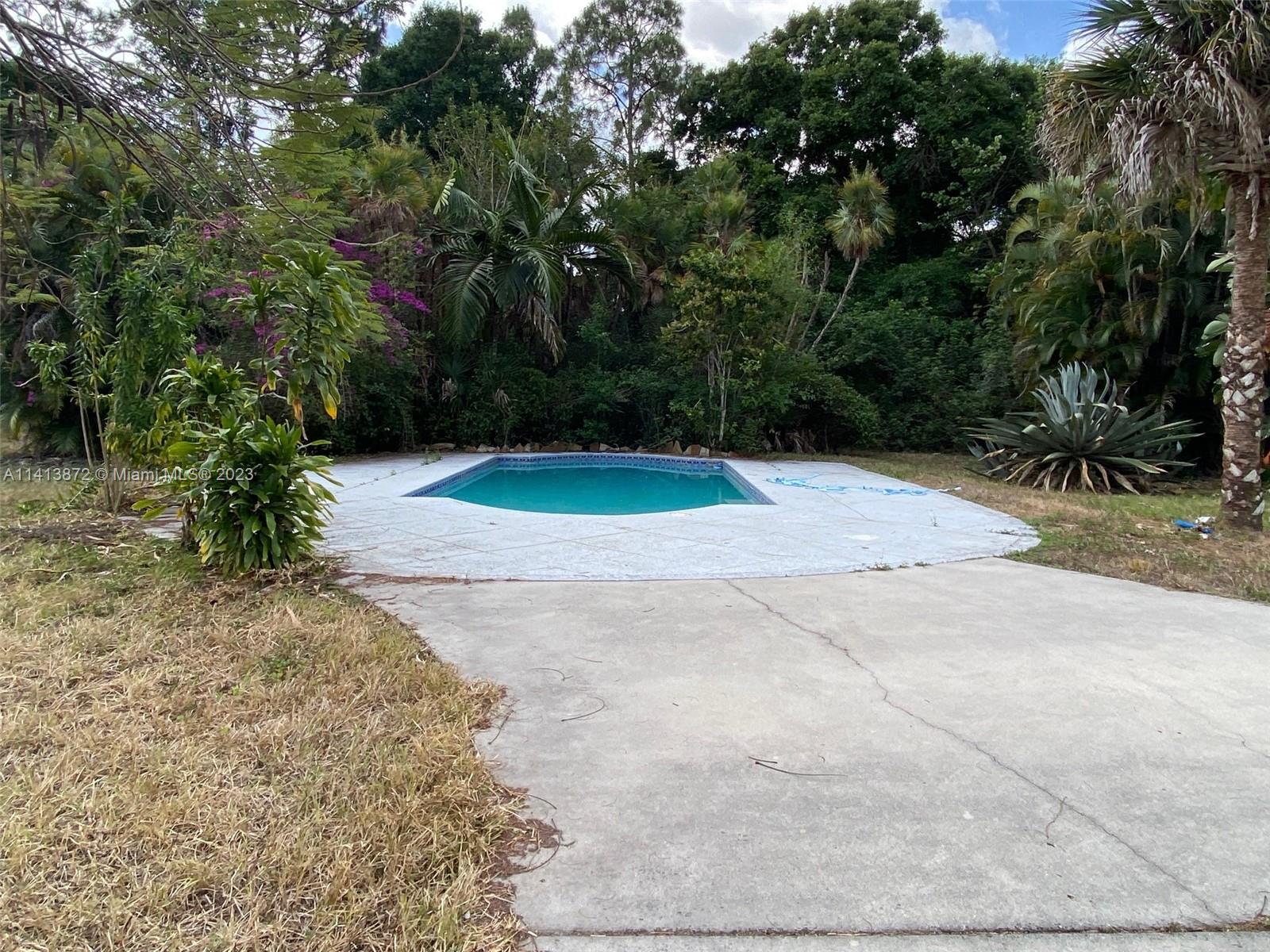 3141 C Road Loxahatchee, FL 33470 - Photo 2 of 16 a view of outdoor space and yard