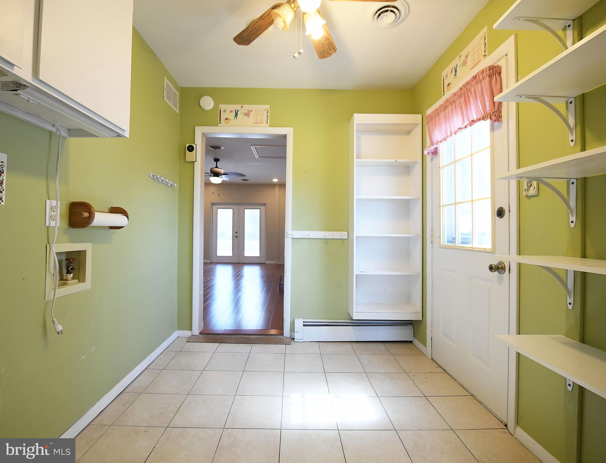 355 Red Pump Road Rising Sun, MD 21911 - Photo 15 of 39 LAUNDRY ROOM WITH DOOR TO SIDE DECK