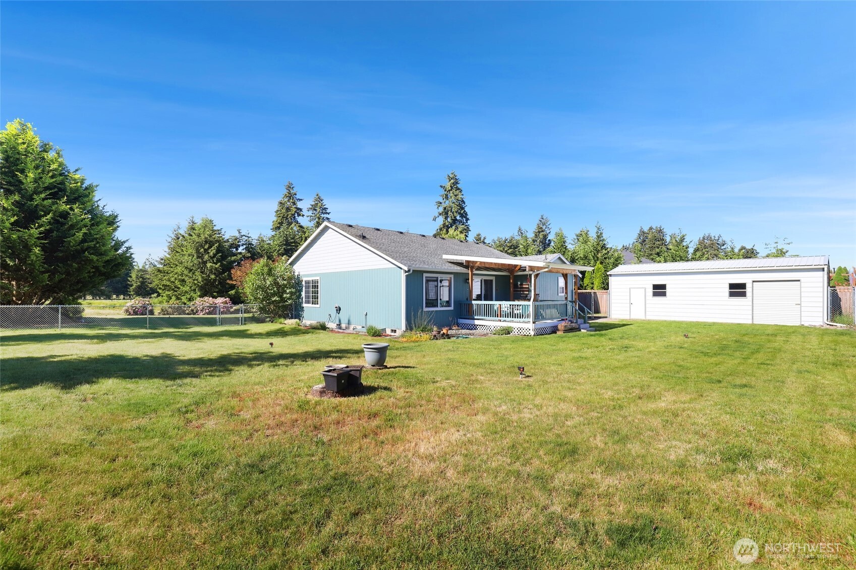 8008 188th Avenue Southwest Rochester, WA 98579 - Photo 34 of 40 a house view with a garden space