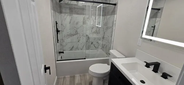 a bathroom with a sink and a toilet