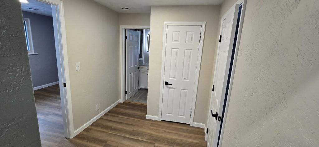 916 Indiana Avenue Avonmore, PA 15618 - Photo 20 of 32 a view of a hallway with wooden floor
